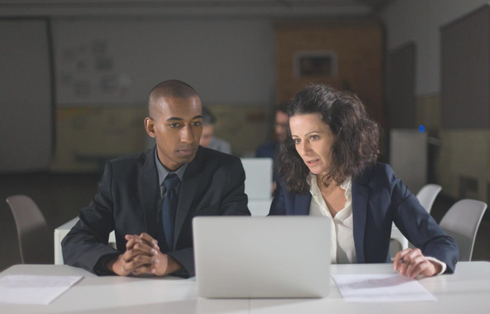 Financial analysis workspace with company reports and charts